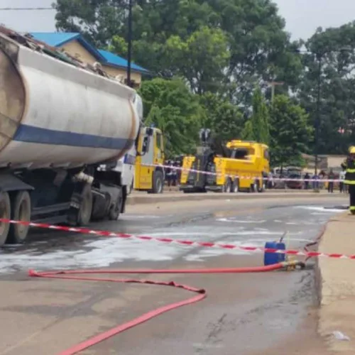 Ticking time bomb: Desperate Delta residents scoop petrol from leaking tanker