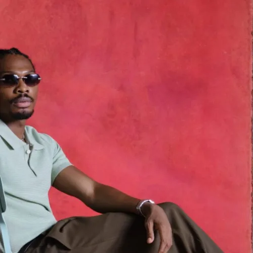 This Mike Afolarin Look Is Exactly How to Wear a Knit Polo With Wide-Leg Trousers
