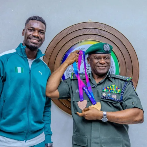 IGP Disu receives Commonwealth Games Champion Ezekiel Nathaniel