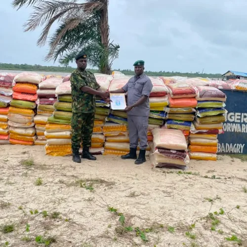 Navy hands over 364 bags of foreign rice to customs in Badagry