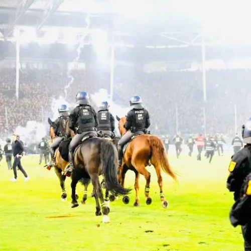 Fans, police injured as pitch invasion mars 2026 German Cup clash