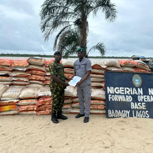 Navy hands over 143 bags of foreign rice to customs in Badagry